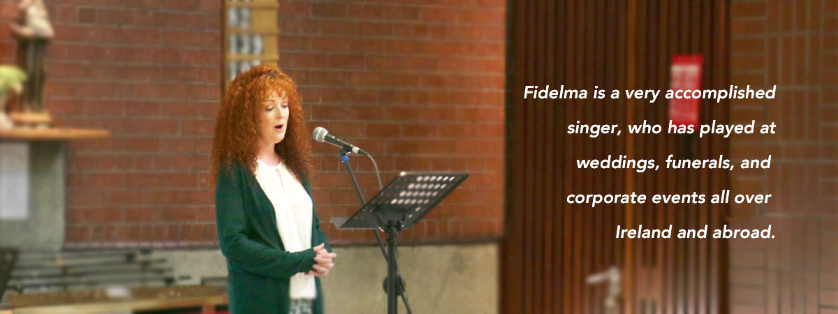 Fidelma singing at a church wedding.