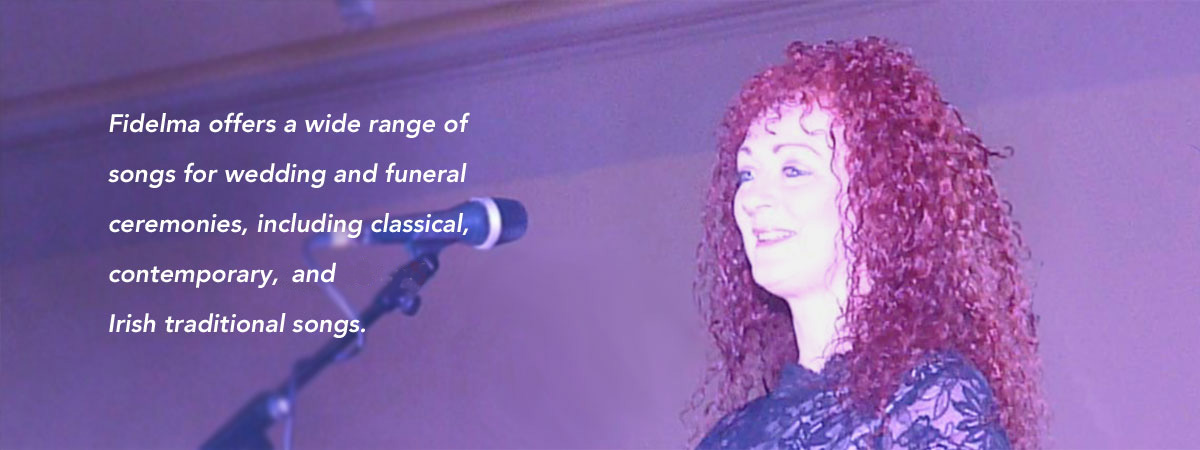 Fidelma singing at a concert with CCF Orchestra, Dublin.